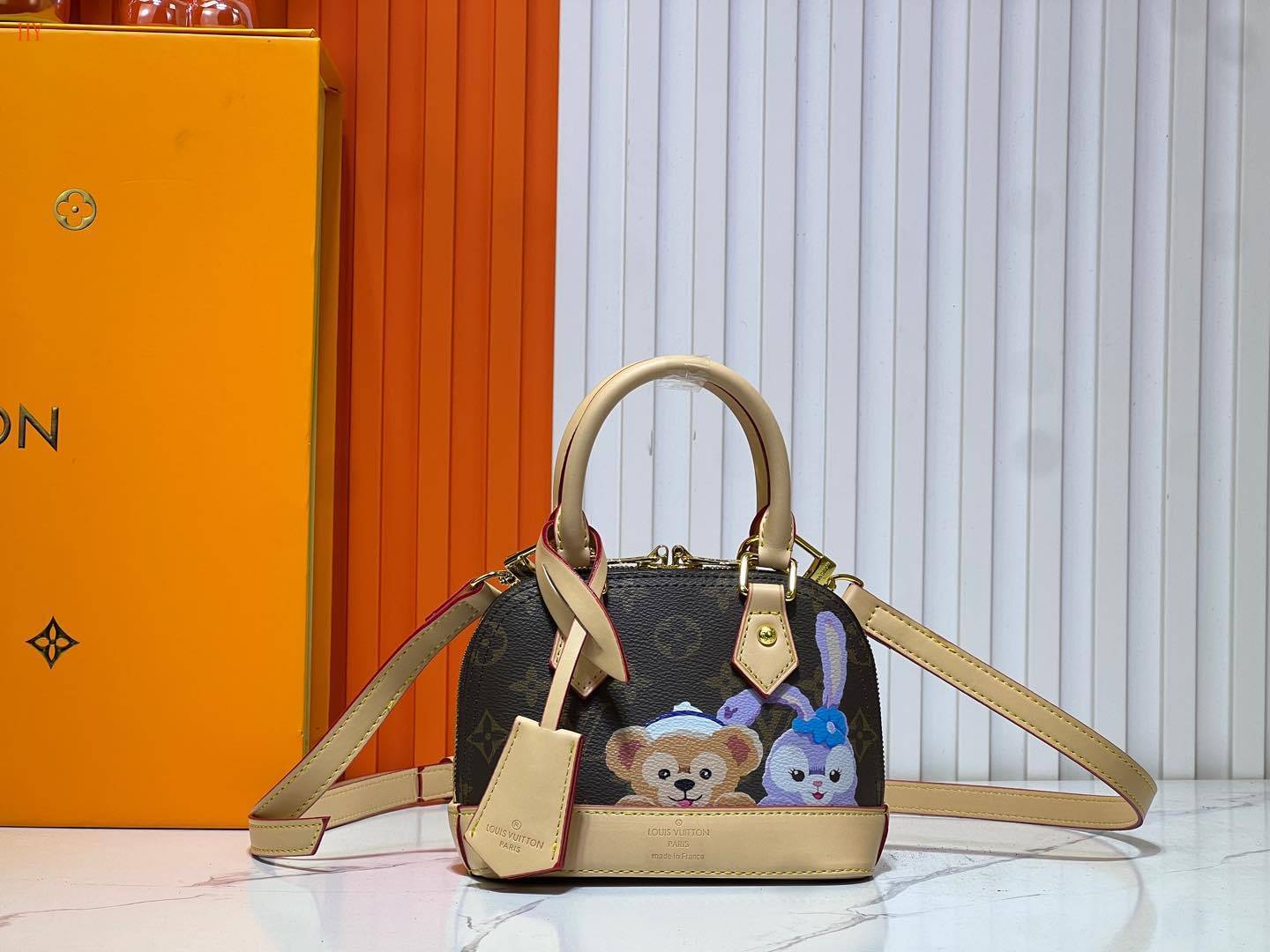 louis vuitton 18x12x8 monogram bag with character design