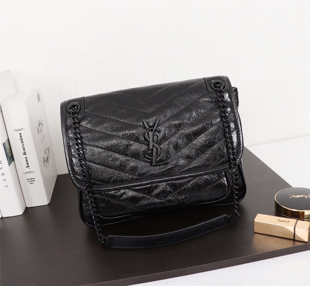 yves saint laurent black quilted handbag 28x20x9