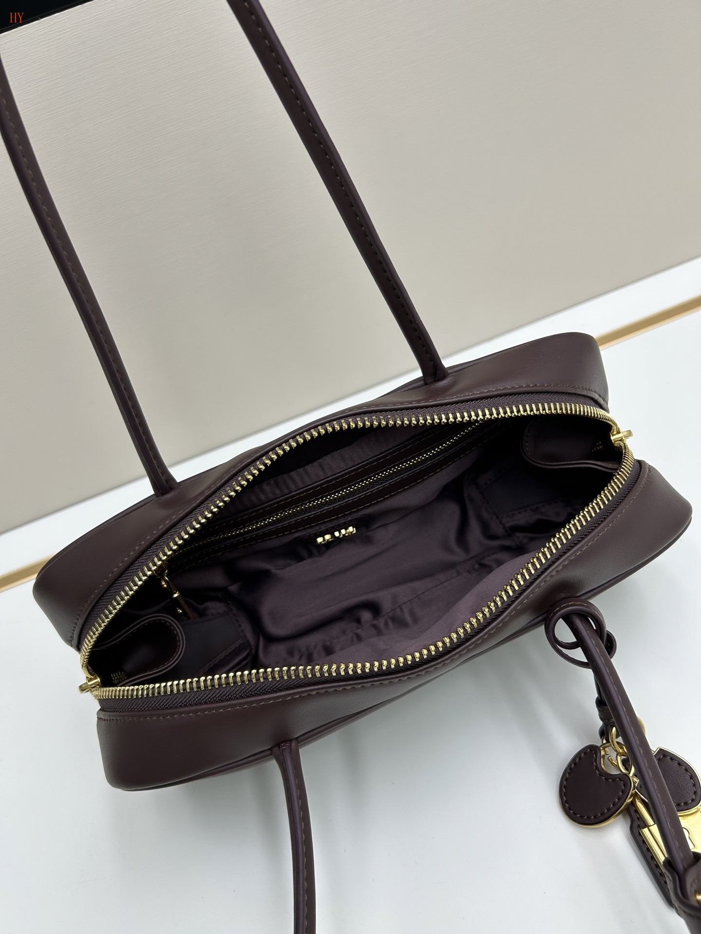 miu miu brown handbag 28*11*8 cm with lock charm - Image 2