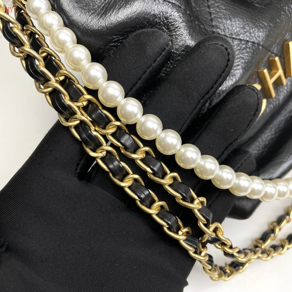 chanel black leather drawstring bag with pearl chain - Image 3