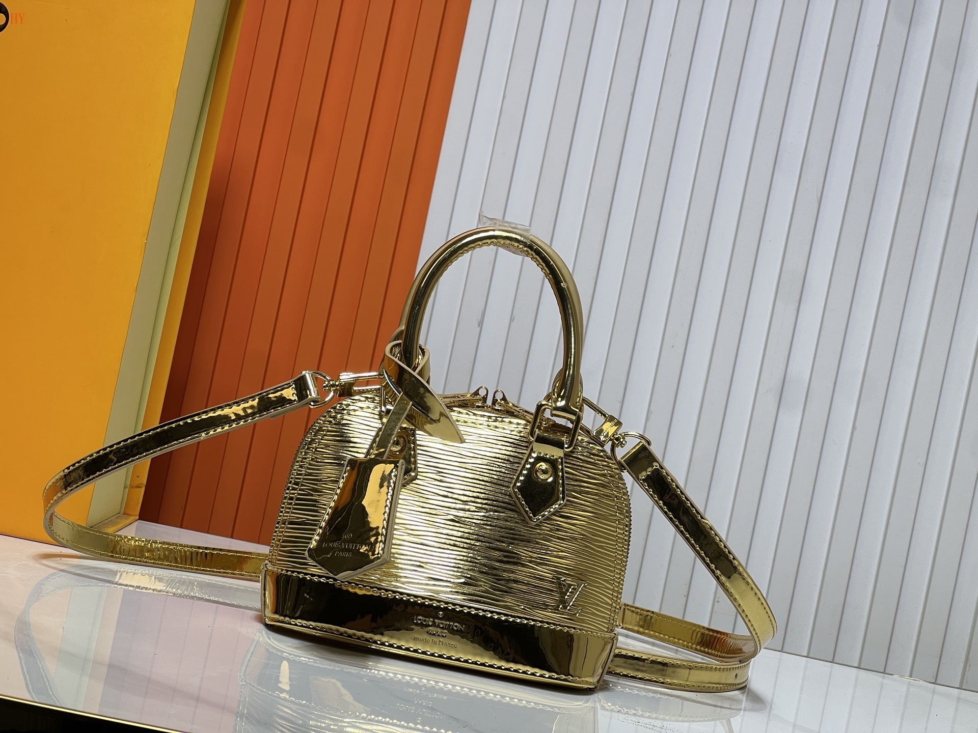 louis vuitton gold epi leather handbag 18x12x8