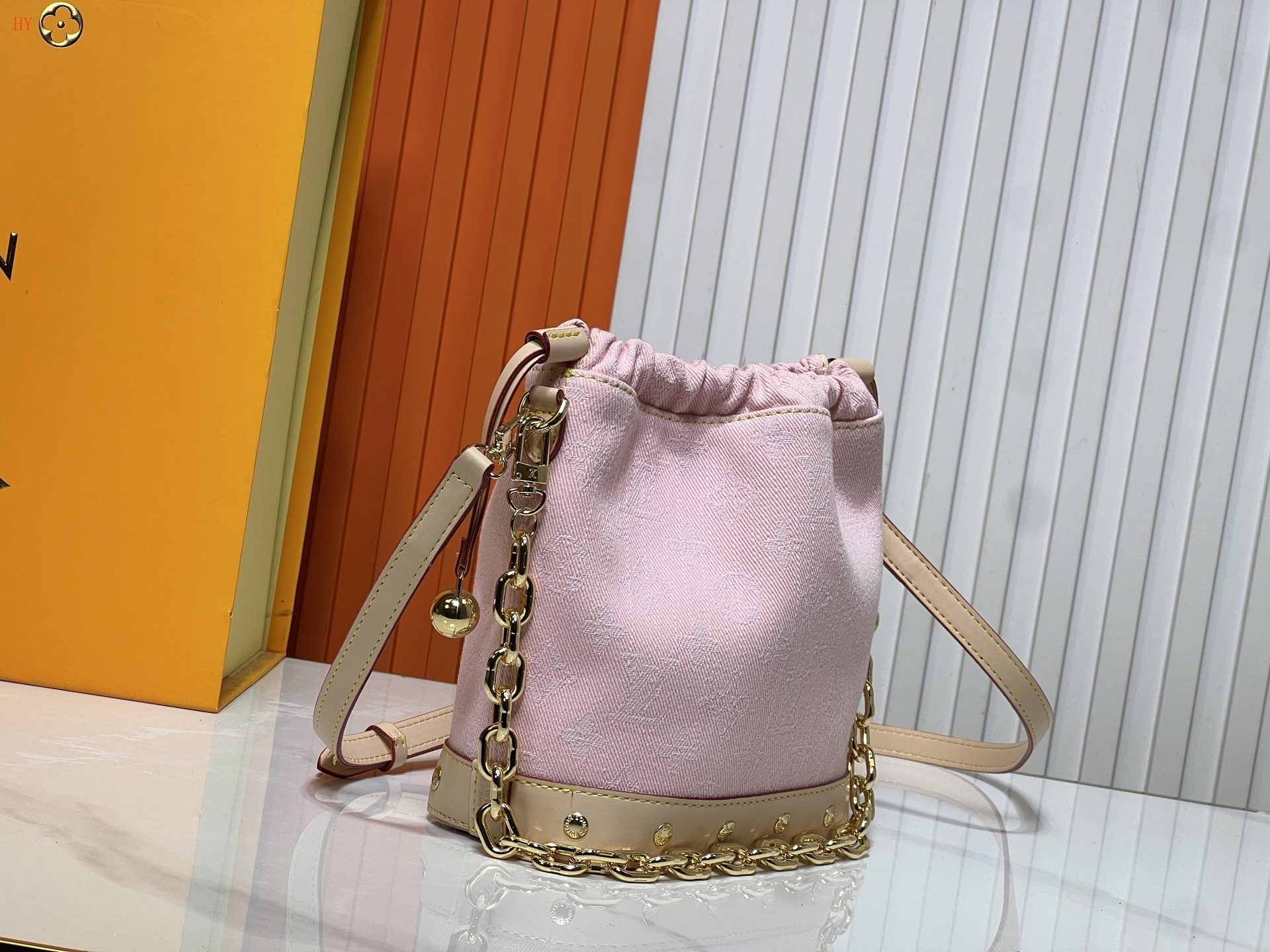 louis vuitton pink drawstring bag with chain strap - Image 8