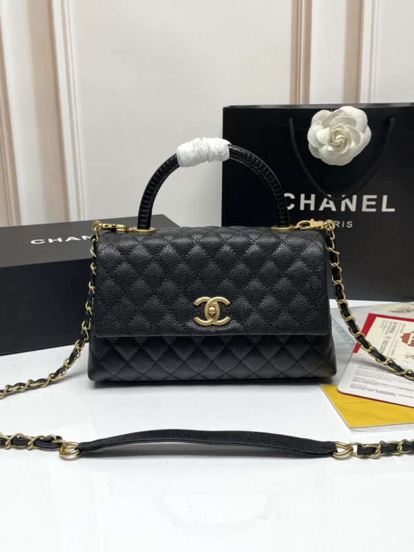 chanel black quilted handbag with gold accents