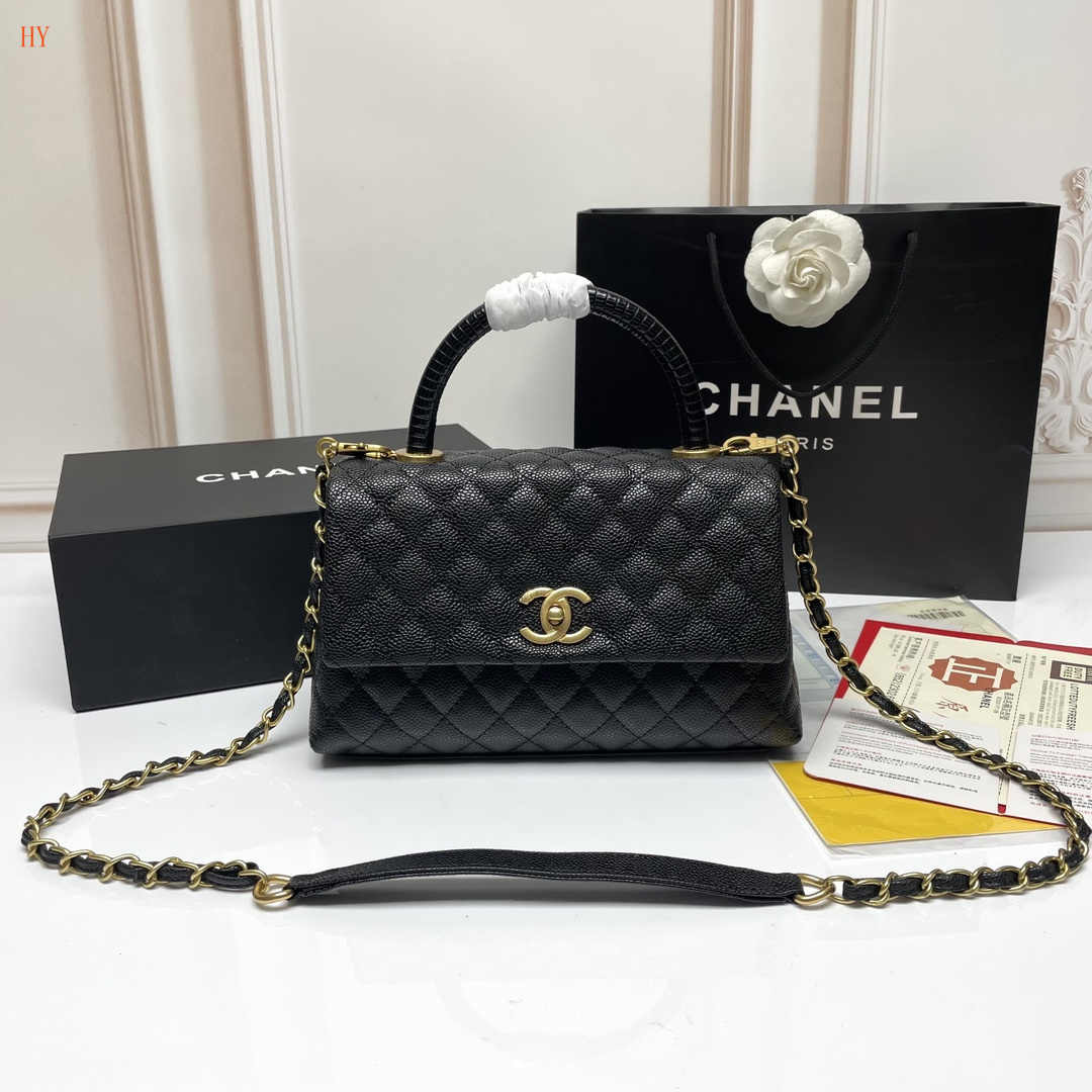 chanel black quilted handbag with gold accents