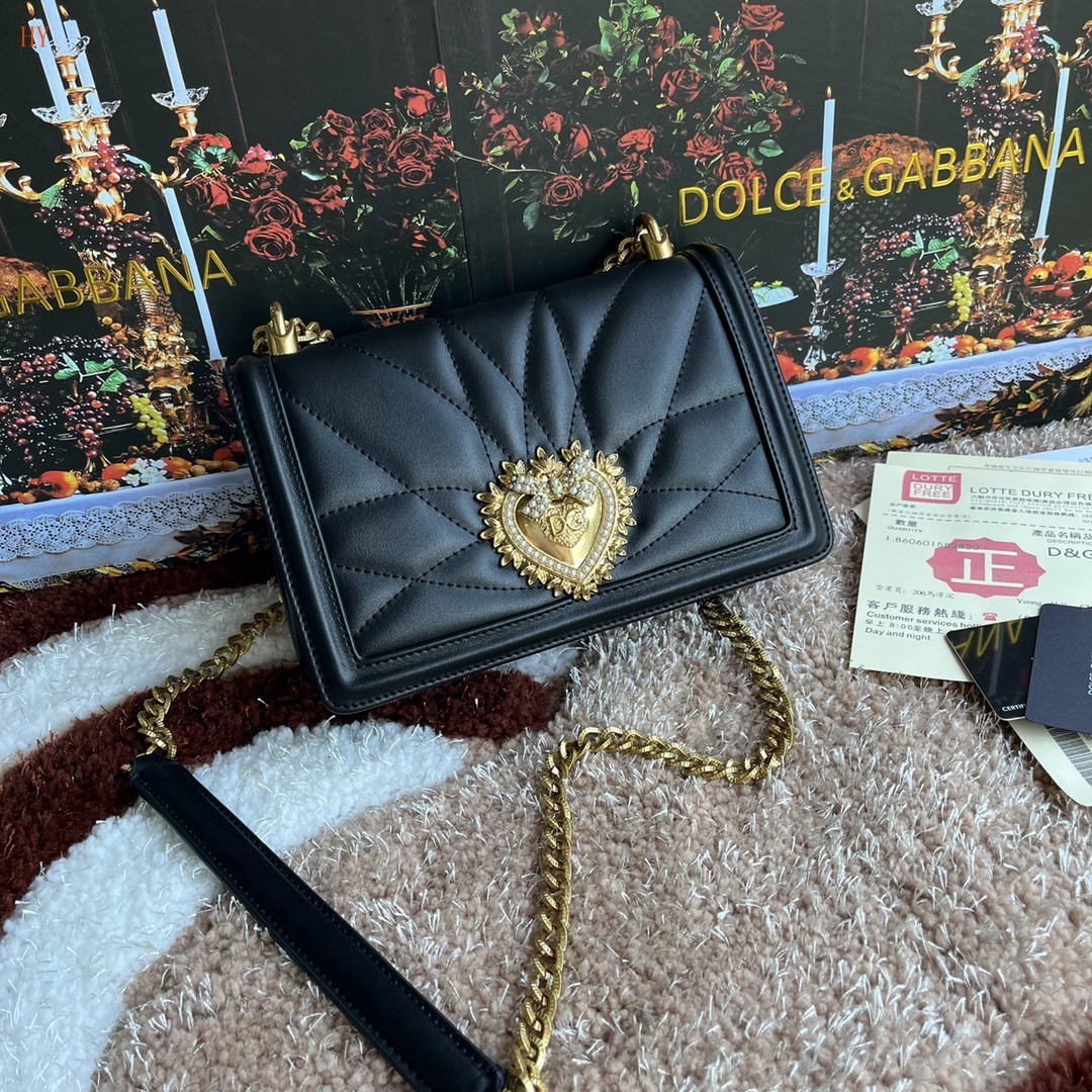dolce & gabbana quilted black bag with heart emblem